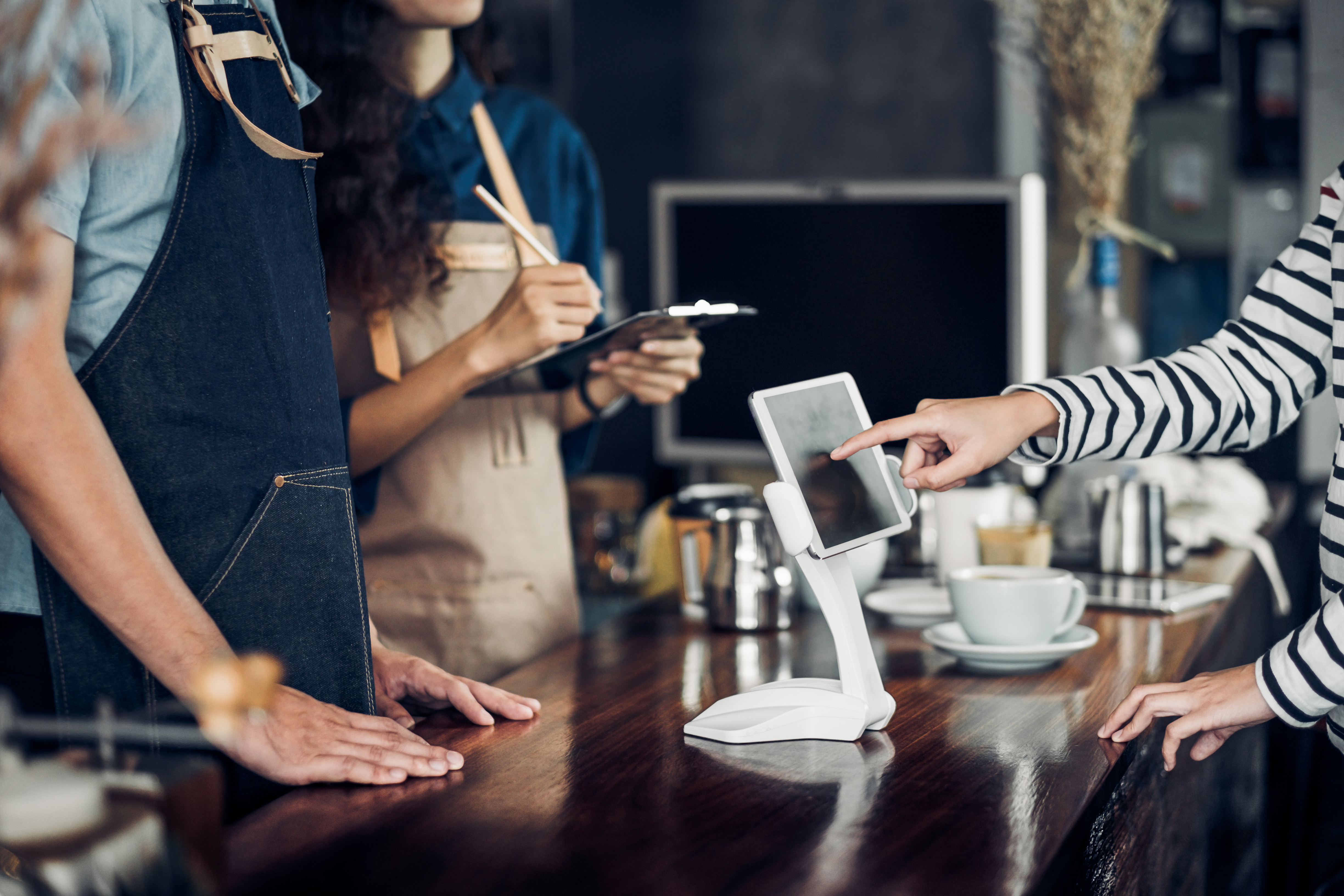 Customers and restaurants using technology from a successful restaurant tech deployment.