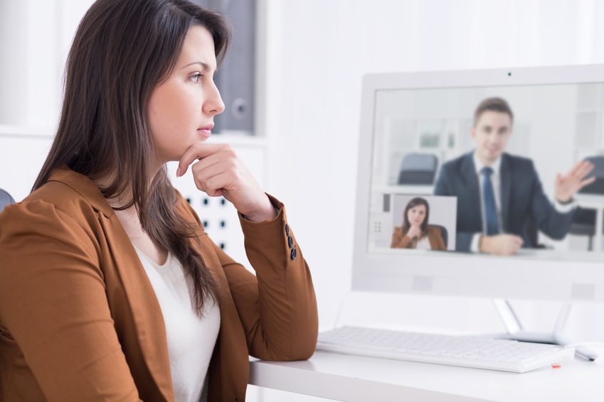 virtual meeting on desktop monitor