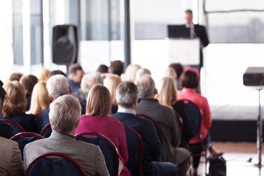 group seated at a presentation